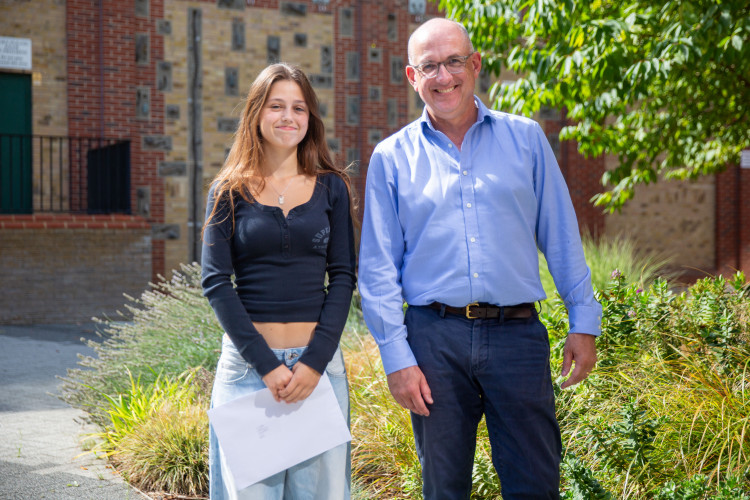 St Benedict's student Mia V with Headmaster Joe Smith (credit: St Bendict's School).