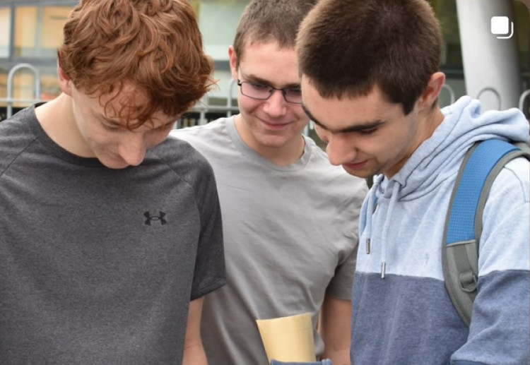 Staff and students at Crispin School celebrate GCSE achievements, with remarkable results in Music, Graphics, Drama, Photography, and Biology.