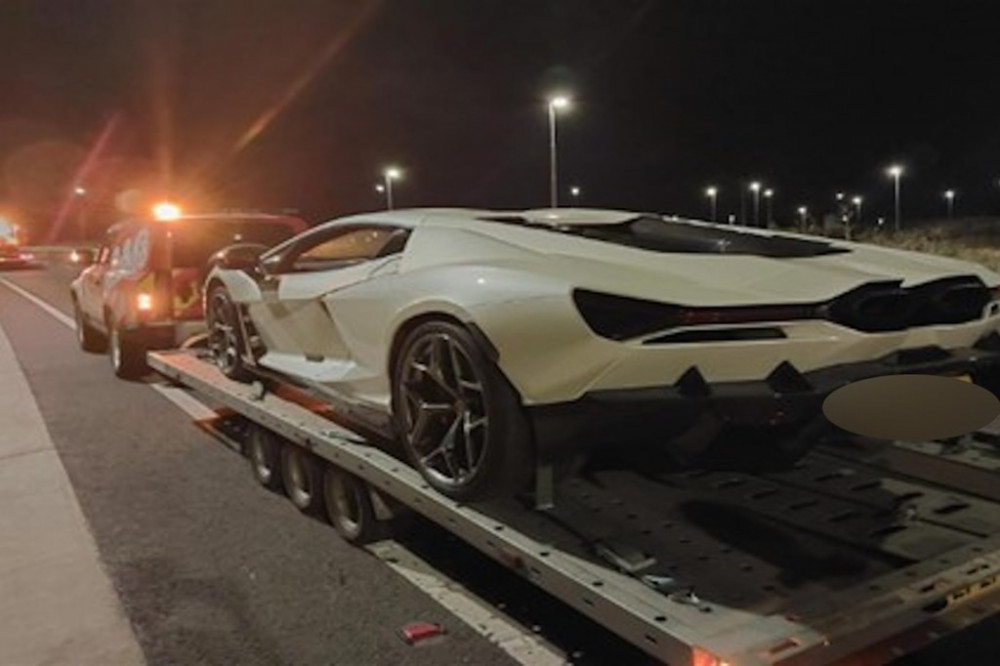 Off the road. One of the supercars. 