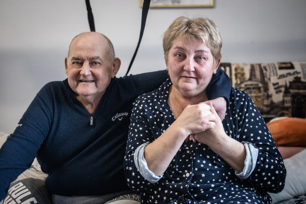 Anatoly and his wife Tatyana after he received his wheelchair