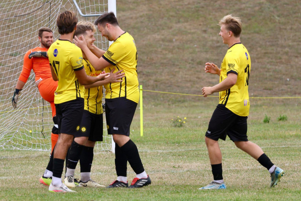 Harry Prince is congratualted after the opening goal. Picture by Vic Evans. Harry Prince is congratualted after the opening goal. Picture by Vic Evans.