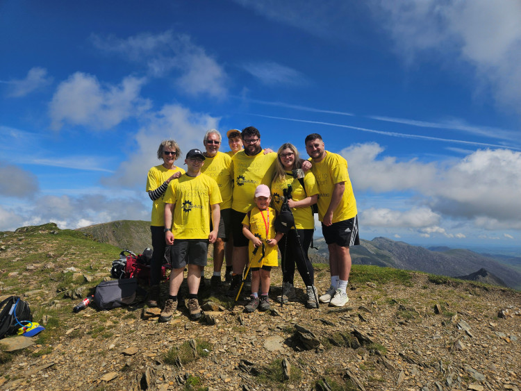 Frankie and Nick Griffin with relatives and staff from Griffins of Stone at the top of Snowdon. (Dougie Mac)