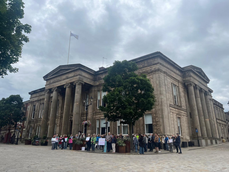 Global Justice Macclesfield are planning another silent vigil outside Macclesfield Town Hall (Credit: Nub News)