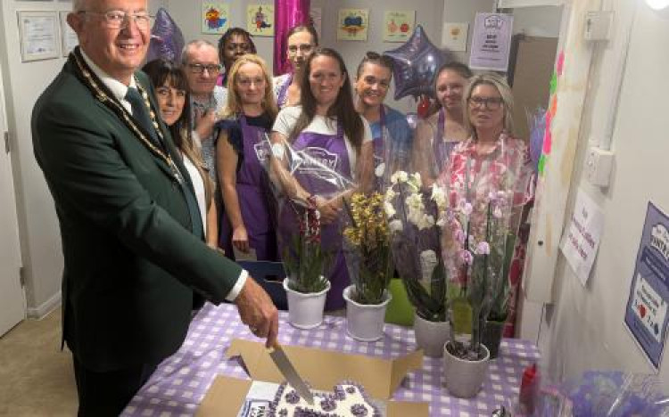 Cllr Steve Liddiard cut the cake at the celebration event.