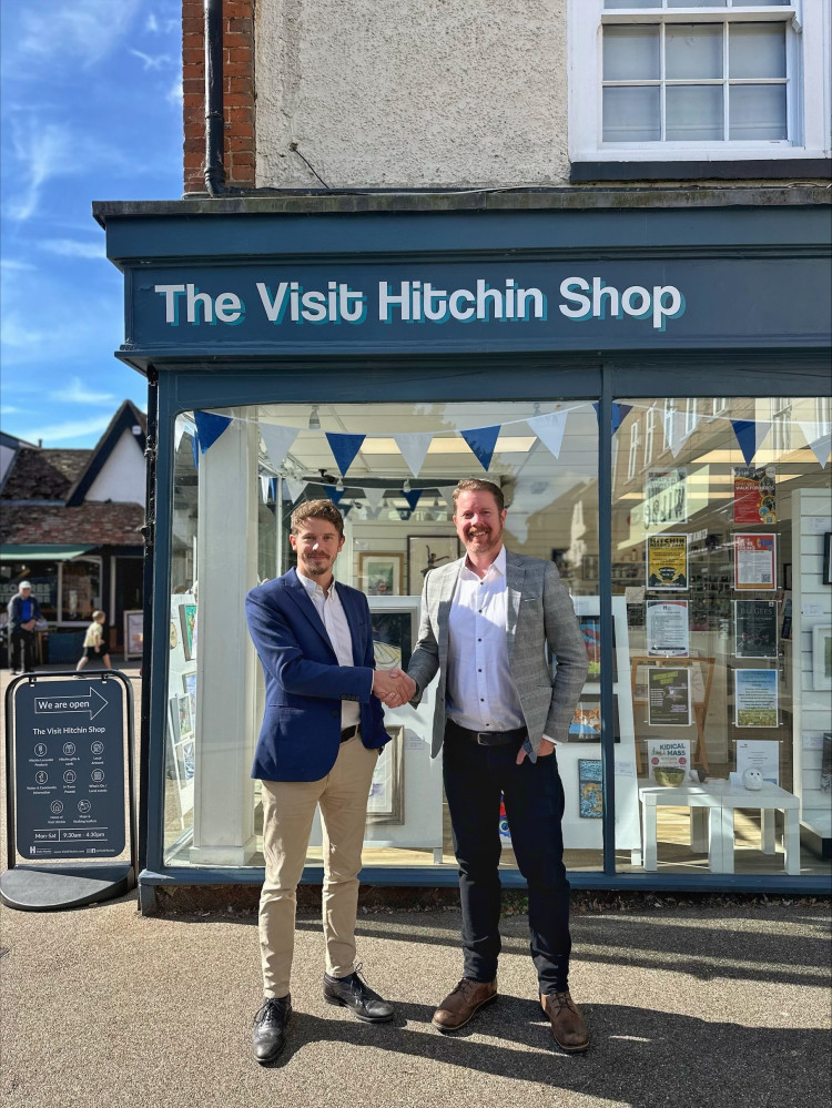 Tom Hardy (Left) passes the baton on to Danny Pearson (Right) 