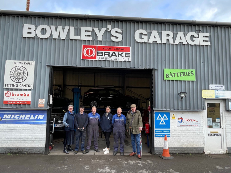 Ross Young with the staff of this SOUP!’s sponsor Bowleys Garage of Wells