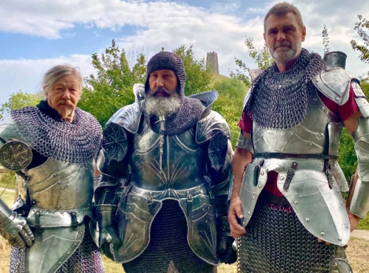 Three men in medieval armour will tackle Glastonbury's 6km Tor Challenge for charity on Saturday, September 27 at 10 am. 