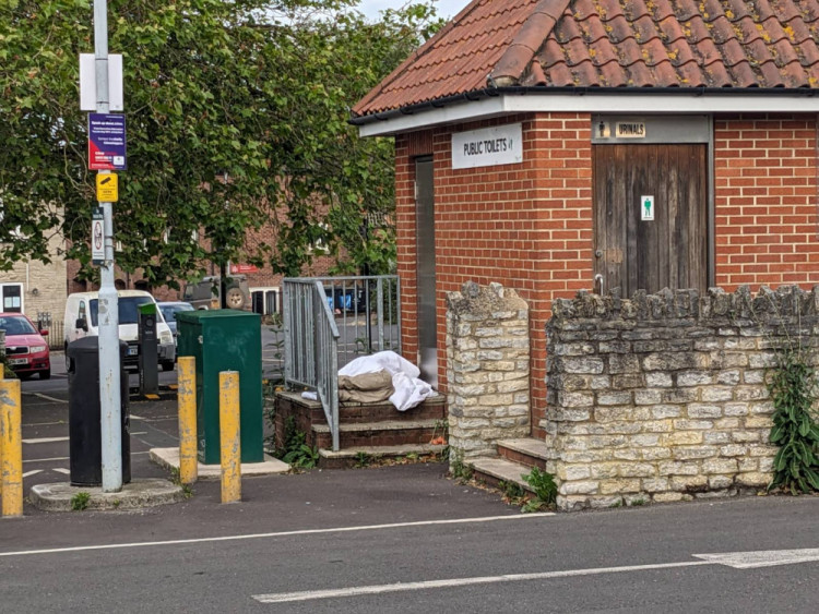 Glastonbury police crack down on anti-social behavior at public toilets amid drug, prostitution, and vandalism reports.