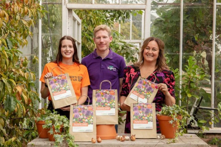 Dobbies’ senior plant buyer Claire Bishop is pictured alongside Ian Clark of Taylor’s Bulbs and Alzheimer’s Research UK fundraiser Catherine Crawford.