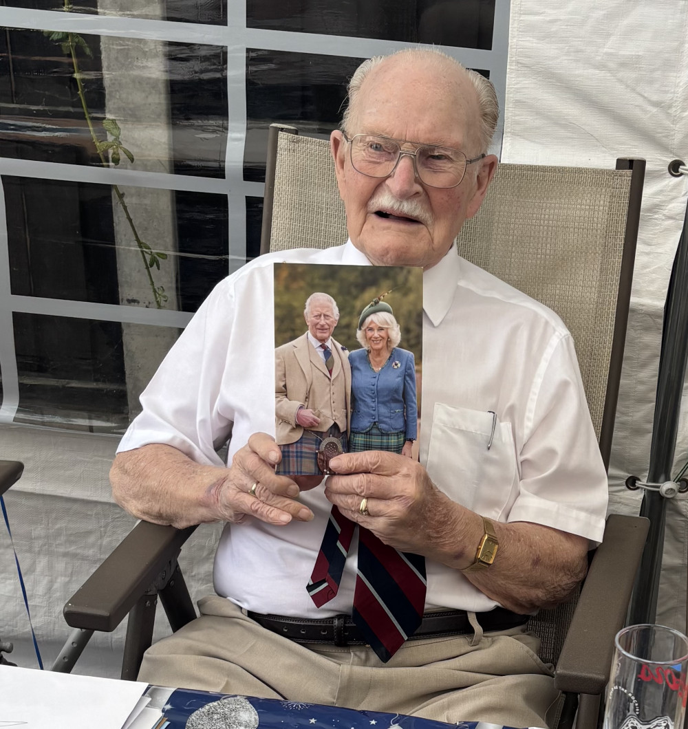 Jim with his card from King Charles. Jim with his card from King Charles.