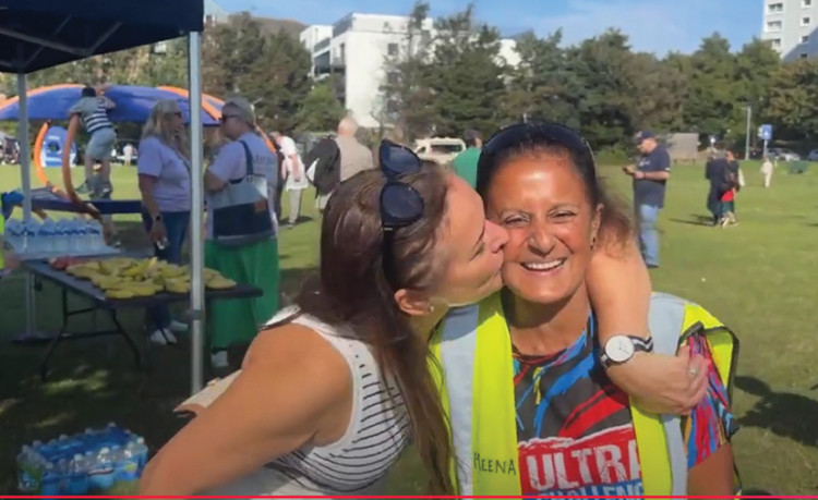 A kiss of thanks for organiser Meena Mitra.