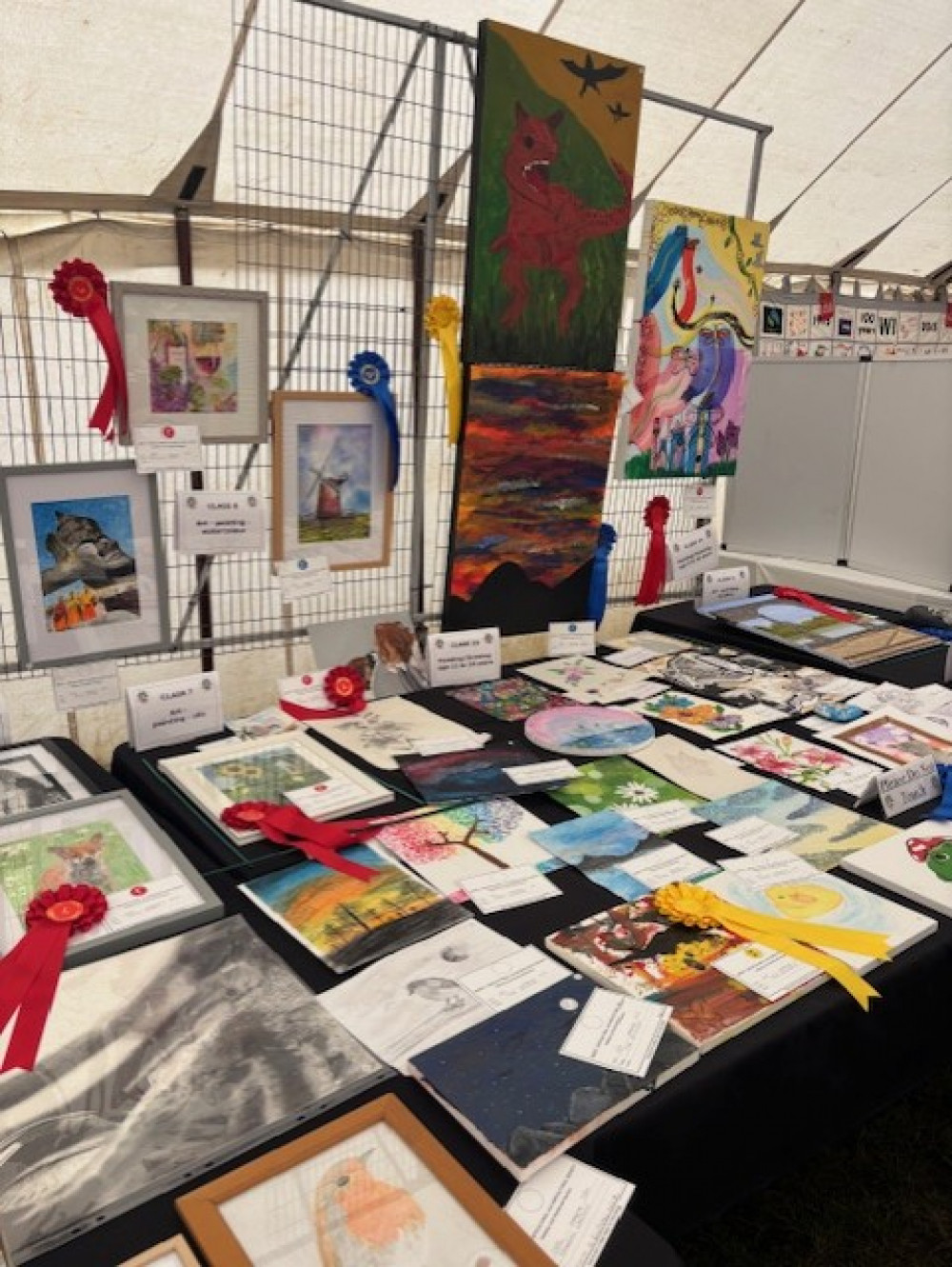Rosettes were awarded across many art categories. Rosettes were awarded across many art categories.