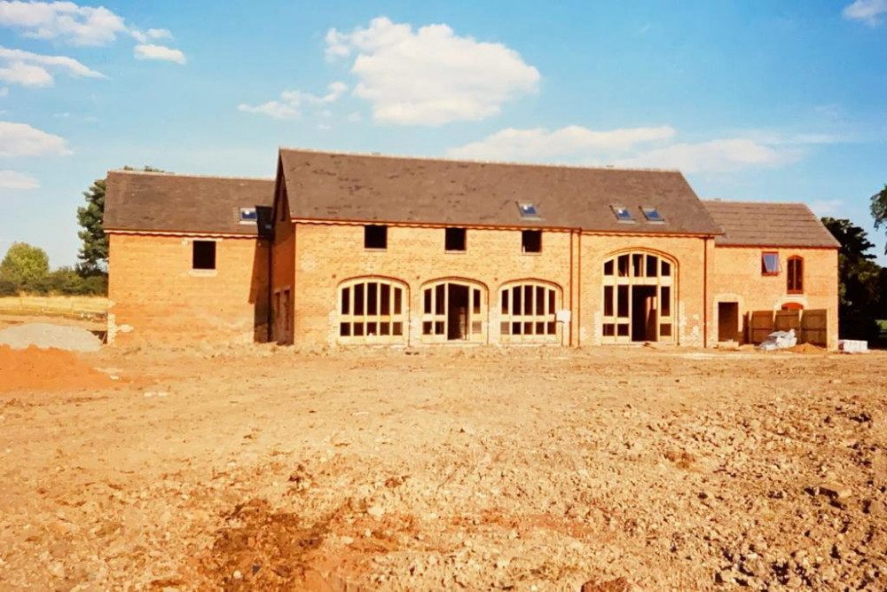 Georgia Goulden-Page and Josh Gill saved £80,000 by renovating their Warwickshire barn themselves (image via SWNS)
