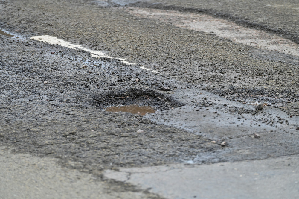 Warwickshire County Council is looking to clamp down on potholes (image via SWNS) Warwickshire County Council is looking to clamp down on potholes (image via SWNS)
