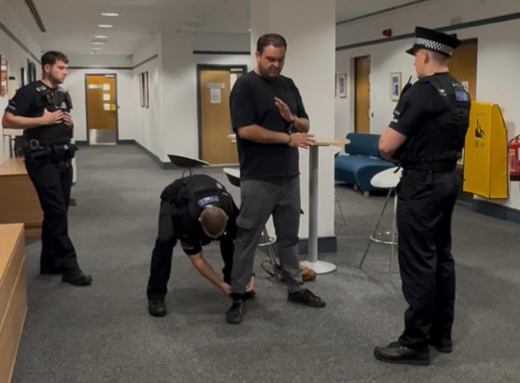 Cllr Sam Journet was handcuffed after being arrested in Basildon Council offices. 
