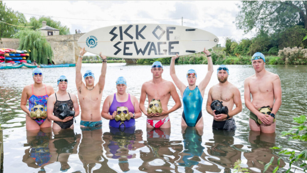 The team were supported by Save Our Lands and River campaigners when they reached the Thames at Teddington (Credit: Surfers Against Sewage)