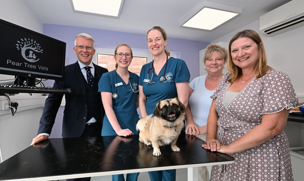 Indie is with (left to right) John Fitzgerald (Chamber), Katie Wain, Aisling McGrath (both Pear Tree Vets), Annie Johnson (Warwickshire County Council), Jo Randall (Warwick District Council)
