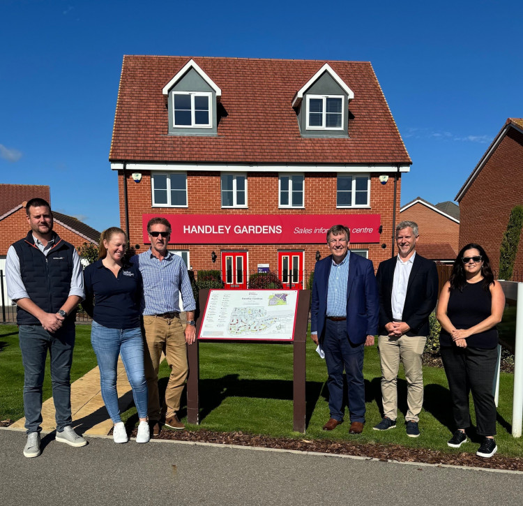 Sir John is pictured with James Lidgate, Managing Director of Taylor Wimpey, Katie Stainsby, Associate Director of POD Management and Adrian Povey of Community Property Care as well as other members of the management team.
