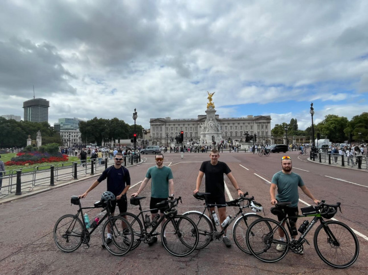 On 27 August, James Redwood, Kieron Lawton, William Rowlands, and Ewan Davies began their journey from Buckingham Palace, supported by driver Jude Metz (Supplied).