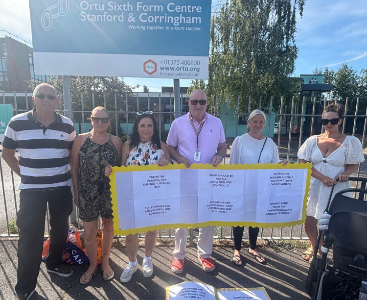 Gary Byrne has been a constant critic of tactics imposed at Mossbourne schools, and is pictured here (centre) joining parents at a protest outside Fobbing Academy. 