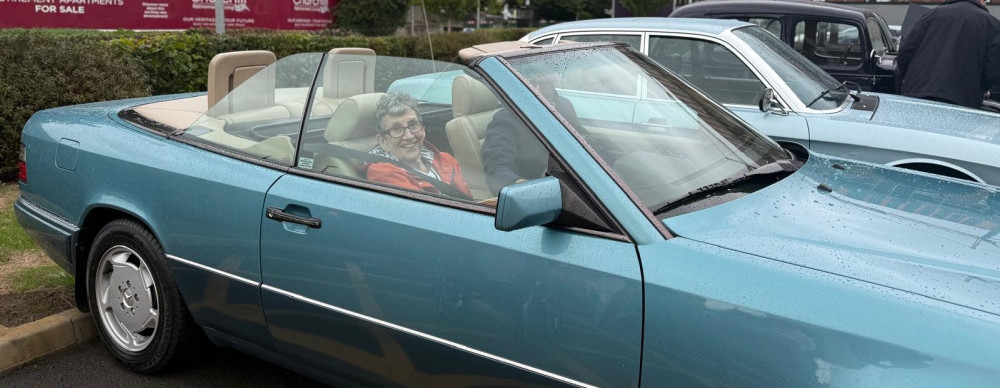 Crandon Springs Care Home resident Wendy, took the chance to try out a classic Mercedes at the vintage car display held at the care home, which she said was "absolutely wonderful."