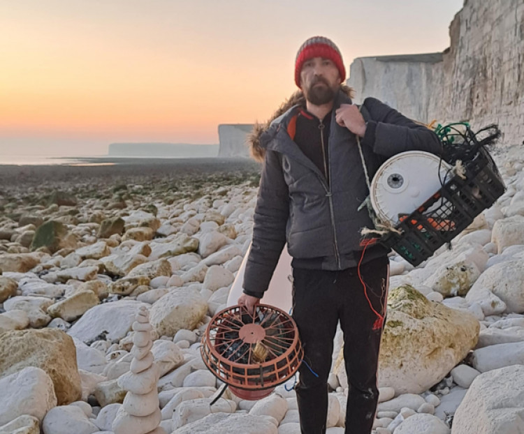 Kingston resident, Remi Got, and his friend picking up litter at the Seven Sister cliffs (Credit: Remi Got)