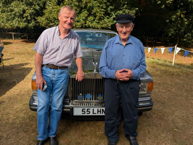 "Sir" Les Ardron (99) with his son in front of his Rollys-Royce Silver Spur. (Photo: Nub News)