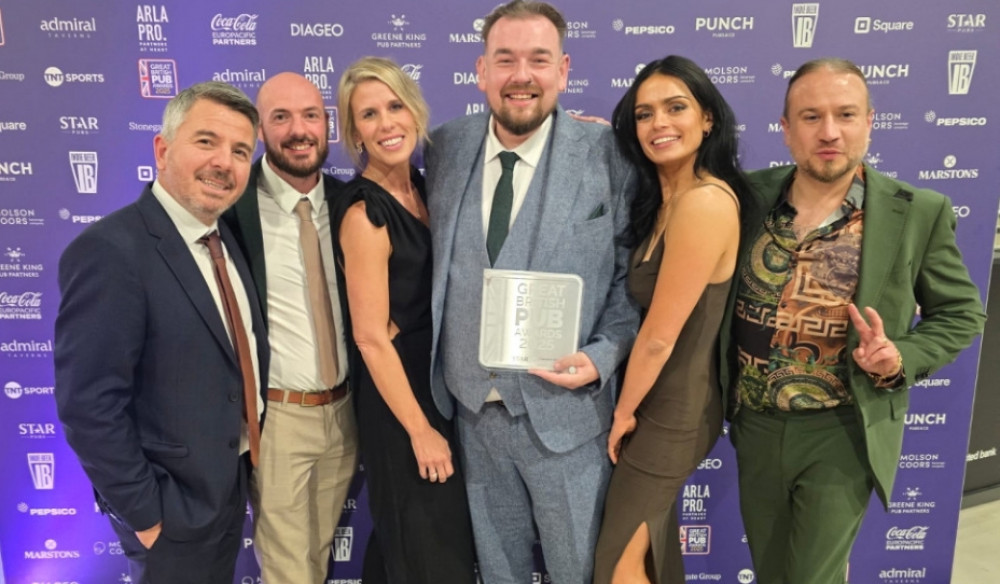 The Black Pug team celebrates with their award. Left to right are Yiannis Markou, Andrew Manning, Alex Crowther, Dave Casson, Alice Huxtable and Ash Woodbine (image supplied) 