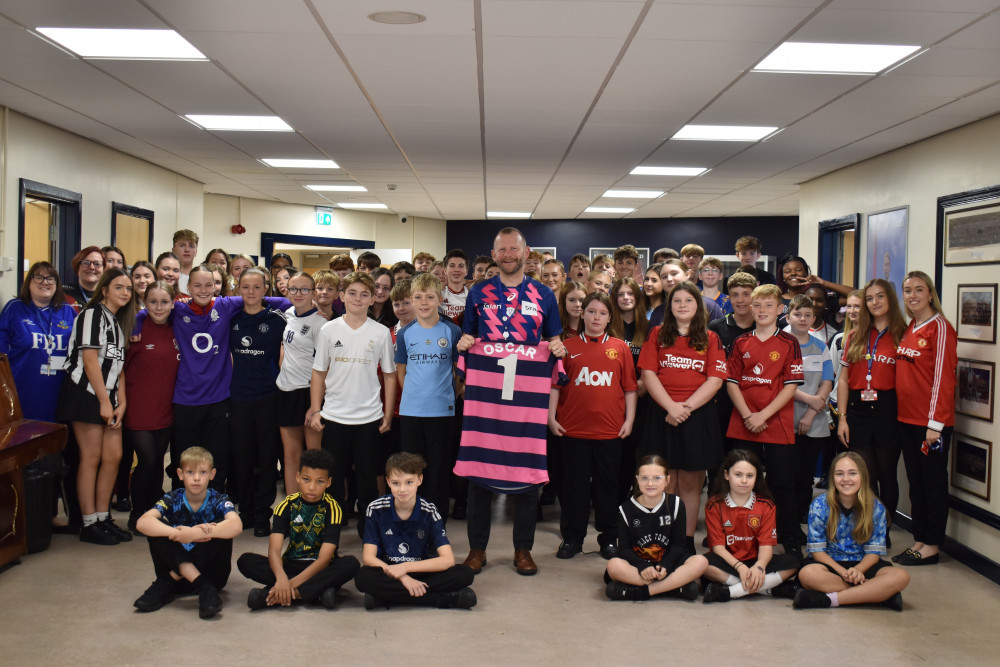 The Macclesfield Academy invited staff and students to wear their favourite sports tops in support of pupil, Oscar Hulley