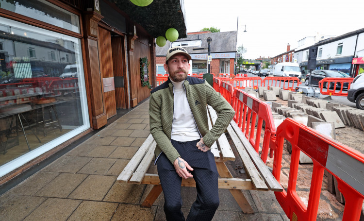 Jay Dunn, a business owner in Romiley, said the roadworks are costing his business money and customers (Image - Jason Roberts)