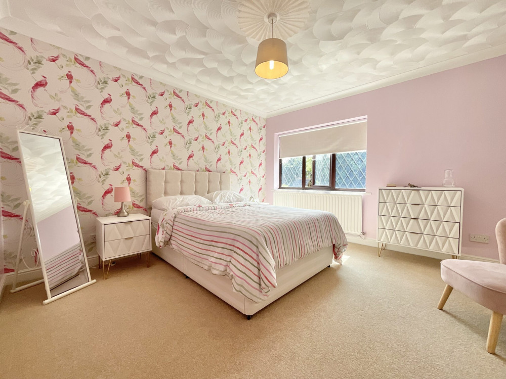 One of four bedrooms (Credit: James Du Pavey)