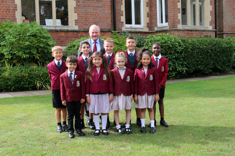 Headmaster, Rob Duigan, with pupils at Crackley Hall School (image supplied) 