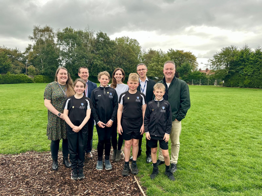 Deputy Headteacher Hayley Rogers, NWAT School Development Partner Michael Forber, Headteacher Chris Priddey. MP Aphra Brandreth and NWAT CEO Steve Docking with member of the school council. (