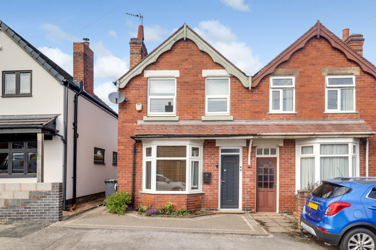 Attractive semi-detached home with driveway parking, EV charging point, and side access to the spacious rear garden