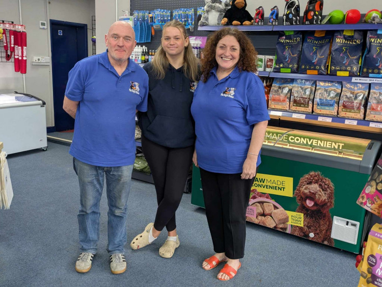 Animal lovers Phil Lane and partner Donna Bonser (far right) are sadly closing the Alsager branch of 'The Dog's Dinner'. (Photo: Nub News)