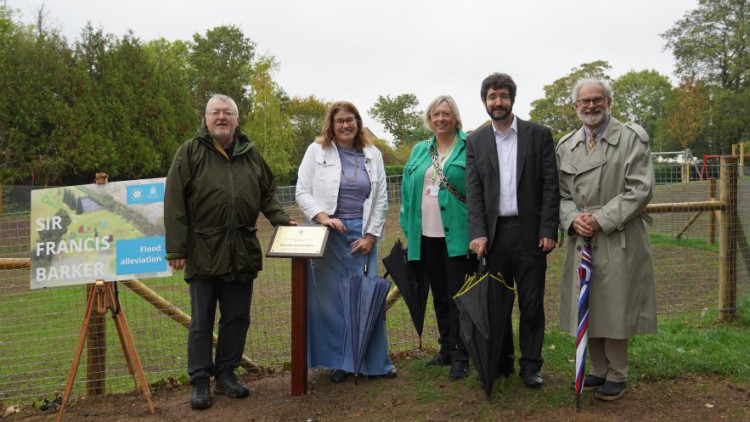 Councillors Manders, G Kirsch, Dunstone and Leader A Kirsch meet with Bruce Stuart to dedicate the new flood alleviation scheme to former Councillor Christine Stuart (Credit: Kingston Council)