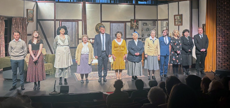 The cast of A Murder Is Announced take their deserved applause at the curtain call.