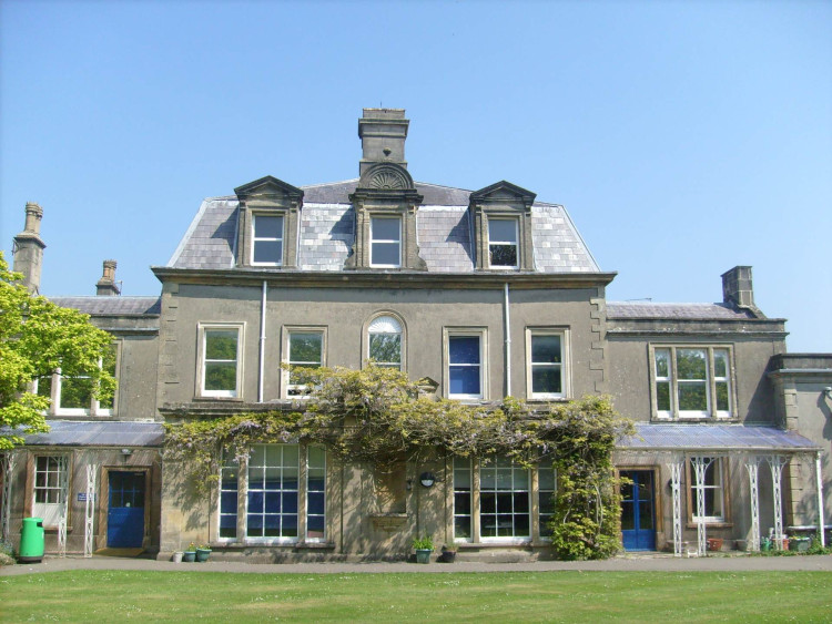 Shepton Mallet's St Paul's CofE VC Junior School gains approval for a steel-framed canopy, preserving its Grade II status within the conservation area.
