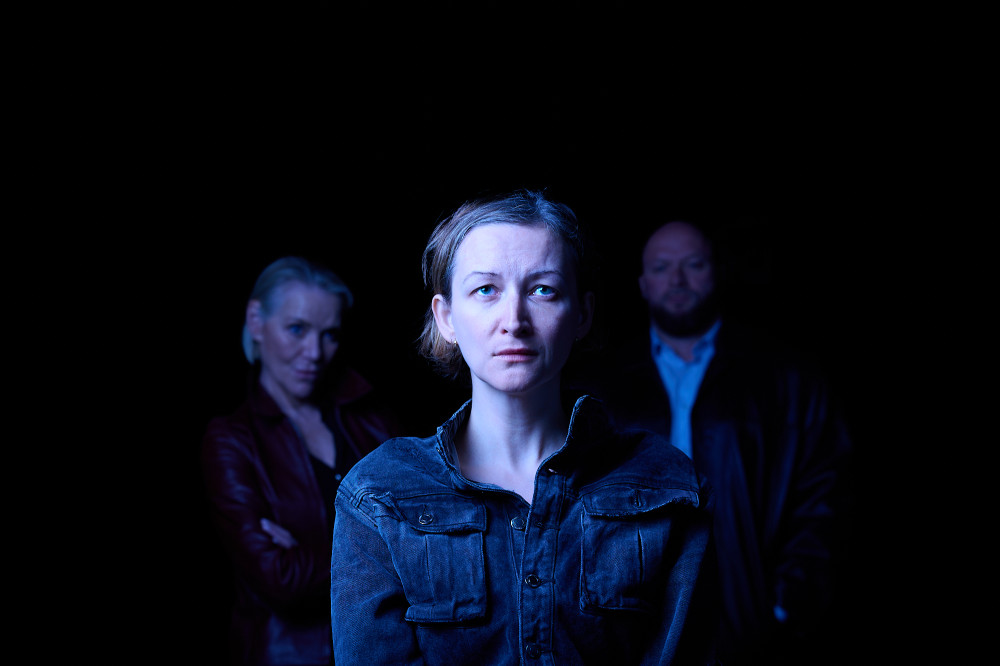 Joanna Stevely as Katurian, under interrogation by detectives Tupolski (L - Ruth MacCallum) and Ariel (R - Ewen Weatherburn) in The Pillowman at the Talisman Theatre (image by Robert Warner)