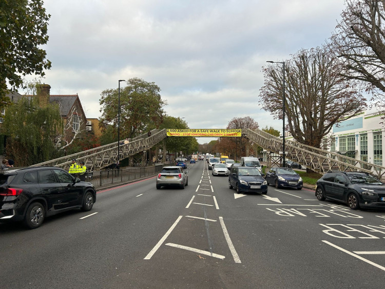 Banner for the protest at St Margarets Roundabout, Twickenham, on 17 October (Credit: Charlotte Lillywhite/LDRS)