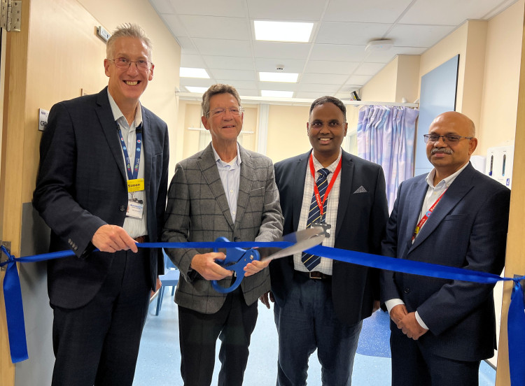 Patient Malcolm Scovell cuts the ribbon on the North Midlands CRDC (image via nhs.uk) 