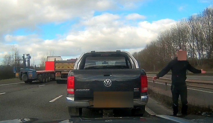 The driver stopped in the outside lane to shout at another road user (image via Warwickshire Police)