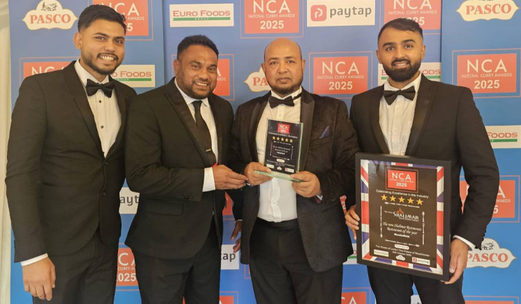 The New Shalimar team with their award (Credit: The New Shalimar)