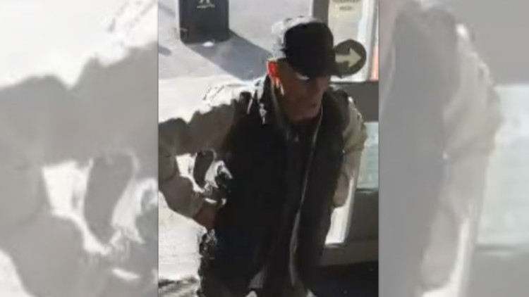Greater Manchester Police are appealing for information following the theft of a charity collection tin from a store on Reddish Lane (Image via GMP)