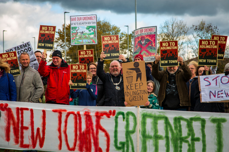 Residents gathered to protest plans for a new town in Adlington on Saturday, October 25 (Credit: Gekko Media) Residents gathered to protest plans for a new town in Adlington on Saturday, October 25 (Credit: Gekko Media)