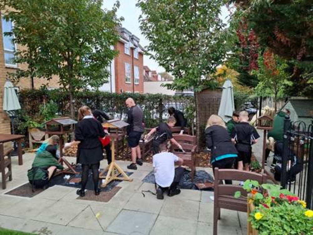 Pupils from Canbury School and residents from Sherwood Grange in Kingston Vale joined forces to do some DIY (Image supplied) Pupils from Canbury School and residents from Sherwood Grange in Kingston Vale joined forces to do some DIY (Image supplied)