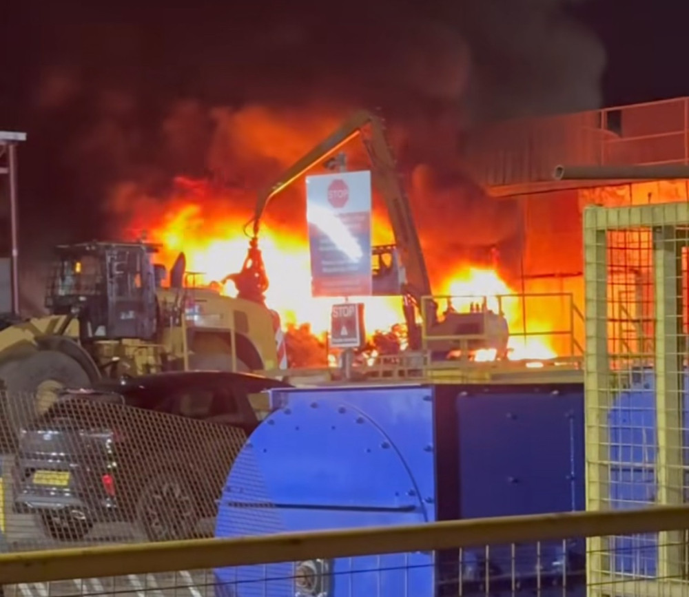 A crane was used to allow firefighters to get to the seat of the blaze. A crane was used to allow firefighters to get to the seat of the blaze.