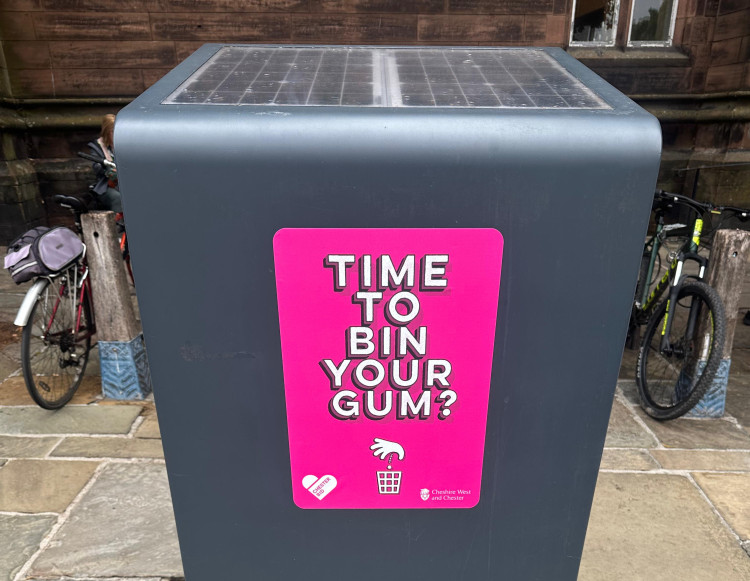 Bright pink stickers were applied to bins in the city centre (Image via: Cheshire West and Chester Council)