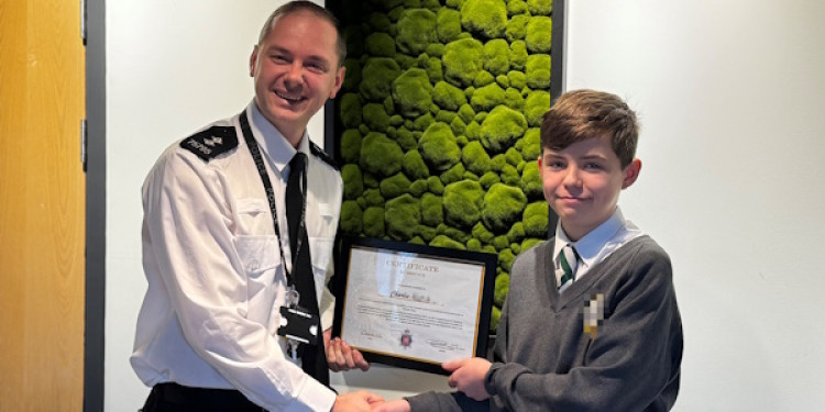 Inspector Dan Selby presented Charlie with a certificate of thanks. 