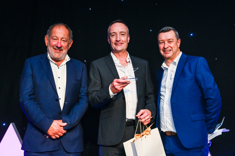 Pete Laing, Crandon Springs Care Home's Head of Maintenance receiving his award from Barchester Healthcare's CEO, Pete Calveley.